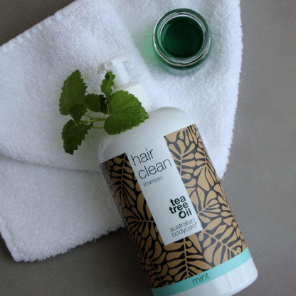 4x3 shampoo da 500 ml al Tea Tree Oil con menta — Offerta bundle - Offerta bundle con 4 shampoo (500 ml): Tea Tree Oil  e Menta